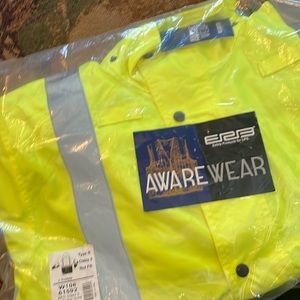 High visibility jacket. New in pkg. reflective lines.